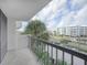 Spacious balcony overlooking the city and palm trees at 400 Island Way # 308, Clearwater, FL 33767