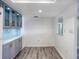 Bright dining area with light walls and wood-look flooring at 400 Island Way # 308, Clearwater, FL 33767