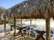 Relaxing poolside cabana with shaded seating at 400 Island Way # 308, Clearwater, FL 33767