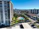 Aerial view showcasing the community pool and surrounding buildings at 400 Island Way # 308, Clearwater, FL 33767