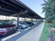 Covered parking garage with ample space for residents' vehicles at 400 Island Way # 308, Clearwater, FL 33767