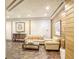 Condo lobby sitting area with wood-paneled walls at 400 Island Way # 308, Clearwater, FL 33767