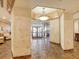 Condo lobby with terracotta tile floor and wood trim at 400 Island Way # 308, Clearwater, FL 33767