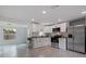 Modern kitchen with stainless steel appliances at 6840 Runnel Dr, New Port Richey, FL 34653