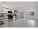 Modern kitchen featuring stainless steel appliances and granite countertops at 6840 Runnel Dr, New Port Richey, FL 34653