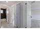 Bright hallway with access to bedrooms and bathroom at 6840 Runnel Dr, New Port Richey, FL 34653
