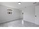 Bedroom with mirrored closet and window at 6840 Runnel Dr, New Port Richey, FL 34653