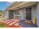 Inviting front porch with sitting area at 6840 Runnel Dr, New Port Richey, FL 34653