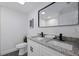 Double vanity bathroom with granite countertop at 6840 Runnel Dr, New Port Richey, FL 34653