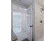 Bathroom with shower and linen closet at 6840 Runnel Dr, New Port Richey, FL 34653