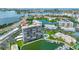 Stunning aerial view of waterfront condo building and surrounding area at 7300 Sun Island S Dr # 1102, South Pasadena, FL 33707