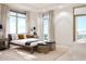 Bright bedroom with a king-size bed and city views at 126 4Th Ne Ave # 1202, St Petersburg, FL 33701