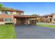 Private carport with a spacious parking area at 4445 Pelorus Dr, New Port Richey, FL 34652