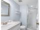 Bathroom with shower, vanity, and updated fixtures at 4445 Pelorus Dr, New Port Richey, FL 34652