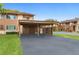 Private carport with a spacious parking area at 4445 Pelorus Dr, New Port Richey, FL 34652