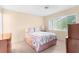 Bedroom with seashell bedding and wood dresser at 4445 Pelorus Dr, New Port Richey, FL 34652