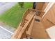 Wooden outdoor staircase leading to an apartment at 4445 Pelorus Dr, New Port Richey, FL 34652
