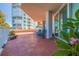 Relaxing balcony with tile flooring, offering a view of the city at 1 Seaside Ln # 104, Belleair, FL 33756