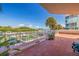 Spacious balcony overlooking the marina, perfect for enjoying water views at 1 Seaside Ln # 104, Belleair, FL 33756