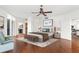 Main bedroom with hardwood floors and water views at 1 Seaside Ln # 104, Belleair, FL 33756