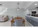 Dining area with wood table and chairs, open to kitchen at 371 Coldeway Dr # H12, Punta Gorda, FL 33950