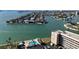 Waterfront condos with outdoor pool, lounge area, and water views in Florida at 6075 Shore S Blvd # 501, Gulfport, FL 33707