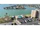 Waterfront condo features an outdoor pool, lounge area, and convenient parking at 6075 Shore S Blvd # 501, Gulfport, FL 33707