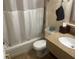 Clean bathroom with a shower/tub combo and granite vanity at 2506 N Rocky Point Dr # 429, Tampa, FL 33607