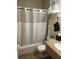 Well-lit bathroom featuring a shower/tub and granite countertop at 2506 N Rocky Point Dr # 429, Tampa, FL 33607