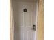 Clean condo front door with keyless entry at 2506 N Rocky Point Dr # 429, Tampa, FL 33607