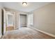 Spacious bedroom with neutral walls and carpeted floors at 500 Waterford W Cir, Tarpon Springs, FL 34688