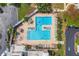 Lush landscaping surrounds this community pool with ample lounge space at 6075 Shore S Blvd # 501, Gulfport, FL 33707