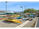 Community kayak storage with many kayaks and paddleboards available for use at 6075 Shore S Blvd # 501, Gulfport, FL 33707