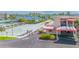 Community clubhouse with covered parking and shuffleboard courts at 6075 Shore S Blvd # 501, Gulfport, FL 33707