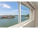 Breathtaking water view from window, featuring a scenic waterway and waterfront properties at 6075 Shore S Blvd # 501, Gulfport, FL 33707
