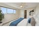 Comfortable bedroom with en-suite bathroom and water views at 6075 Shore S Blvd # 501, Gulfport, FL 33707