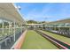 Outdoor bocce ball courts with covered seating areas at 6075 Shore S Blvd # 501, Gulfport, FL 33707