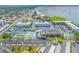 Aerial view of community amenities including tennis courts and pool at 6075 Shore S Blvd # 501, Gulfport, FL 33707