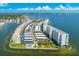 Aerial view of a waterfront community with parking and pool at 6075 Shore S Blvd # 501, Gulfport, FL 33707