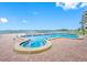 Resort style pool and spa overlooking tranquil water views at 300 Woodette Dr # 202B, Dunedin, FL 34698