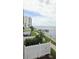 Beautiful landscaping surrounding the building and lovely water views at 300 Woodette Dr # 202B, Dunedin, FL 34698