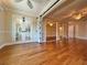 Spacious bedroom with hardwood floors and mirrored closet doors at 100 Bluff View Dr # 208B, Belleair Bluffs, FL 33770