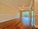 Bright bedroom featuring hardwood floors and ample natural light at 100 Bluff View Dr # 208B, Belleair Bluffs, FL 33770