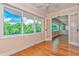 Sunlit office with hardwood floors and French doors at 100 Bluff View Dr # 208B, Belleair Bluffs, FL 33770