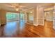 Spacious bedroom with hardwood floors and mirrored closet doors at 100 Bluff View Dr # 208B, Belleair Bluffs, FL 33770
