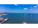 Stunning aerial view showcasing waterfront property and boats at 100 Bluff View Dr # 208B, Belleair Bluffs, FL 33770