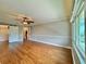 Spacious bedroom with hardwood floors and large windows at 100 Bluff View Dr # 208B, Belleair Bluffs, FL 33770