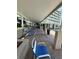 Relaxing poolside lounge area with covered seating at 100 Bluff View Dr # 208B, Belleair Bluffs, FL 33770