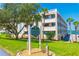 Harbour Club building, private residences, showcasing landscaping at 100 Bluff View Dr # 208B, Belleair Bluffs, FL 33770