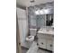 Clean bathroom with updated tile, vanity, and a shower/tub combo at 895 N Village N Dr # 204, St Petersburg, FL 33716